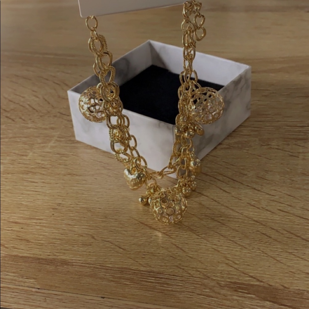 Charm gold bangle bracelet